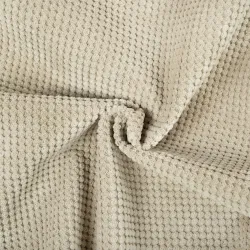 Pouf beige versatile, adatto per soggiorni e camere da letto