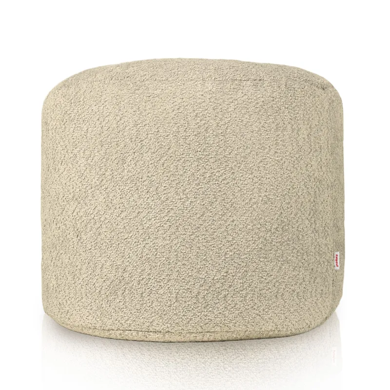 Elegante pouf cilindro beige, perfetto per ogni ambiente