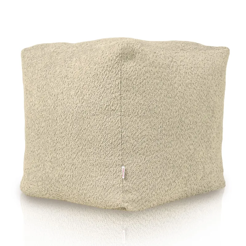Pouf beige morbido in tessuto boucle per aree accoglienti