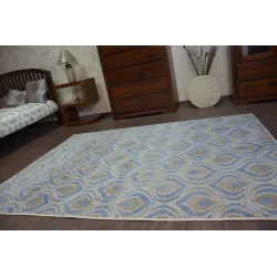 Tappeto DROP JASMINE 030 in tonalità blu, perfetto per ambienti moderni e accoglienti