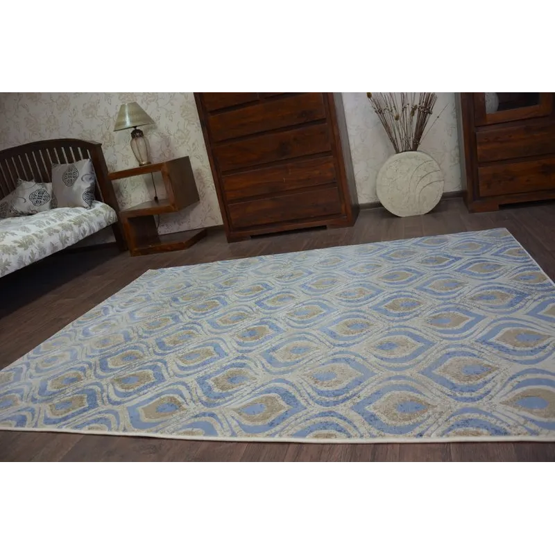 Tappeto DROP JASMINE 030 in tonalità blu, perfetto per ambienti moderni e accoglienti
