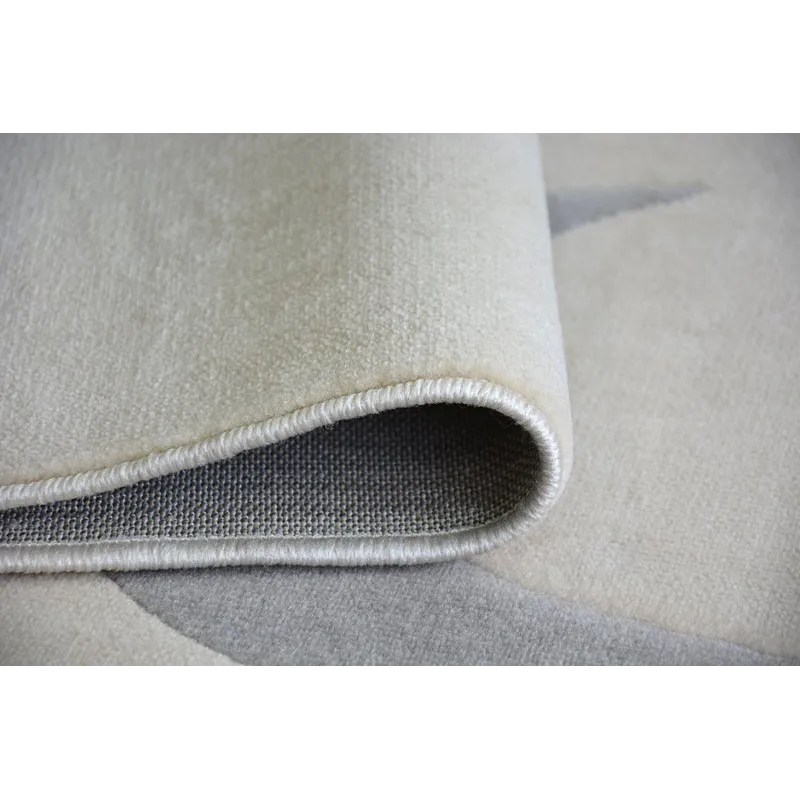 Tappeto elegante in crema, perfetto per interni moderni