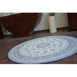 Tappeto in stile boho con accenti blu, ideale per la cameretta