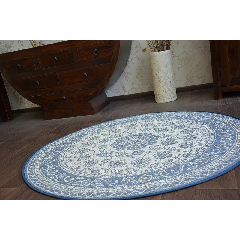 Tappeto in stile boho con accenti blu, ideale per la cameretta
