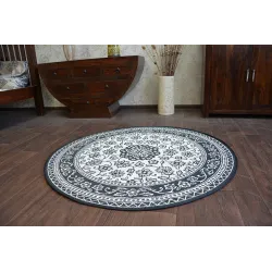 Tappeto circolare in sisal con superficie liscia, perfetto per la camera da letto