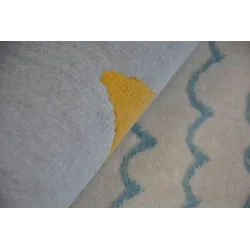 Tappeto in colori pastello per un soggiorno moderno