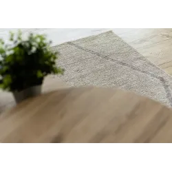 Tappeto crema con motivo etnico, perfetto per interni moderni