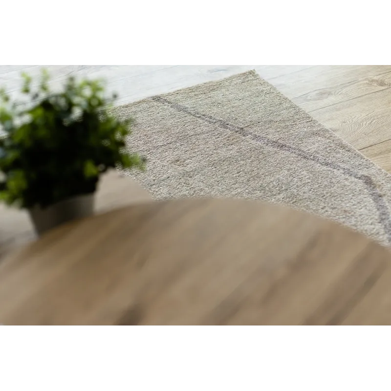 Tappeto crema con motivo etnico, perfetto per interni moderni