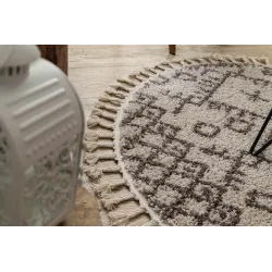 Tappeto elegante in tonalità crema e marrone, ideale per il soggiorno