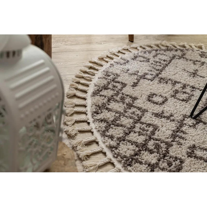 Tappeto elegante in tonalità crema e marrone, ideale per il soggiorno