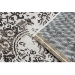 Tappeto vintage morbido beige, perfetto per le camere da letto