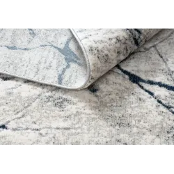 Tappeto moderno REBEC con frange, perfetto per decorare un giardino o una terrazza