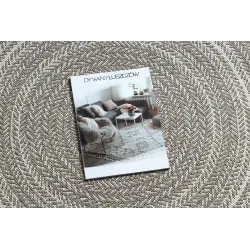 Tappeto circolare in sisal beige, perfetto per interni moderni