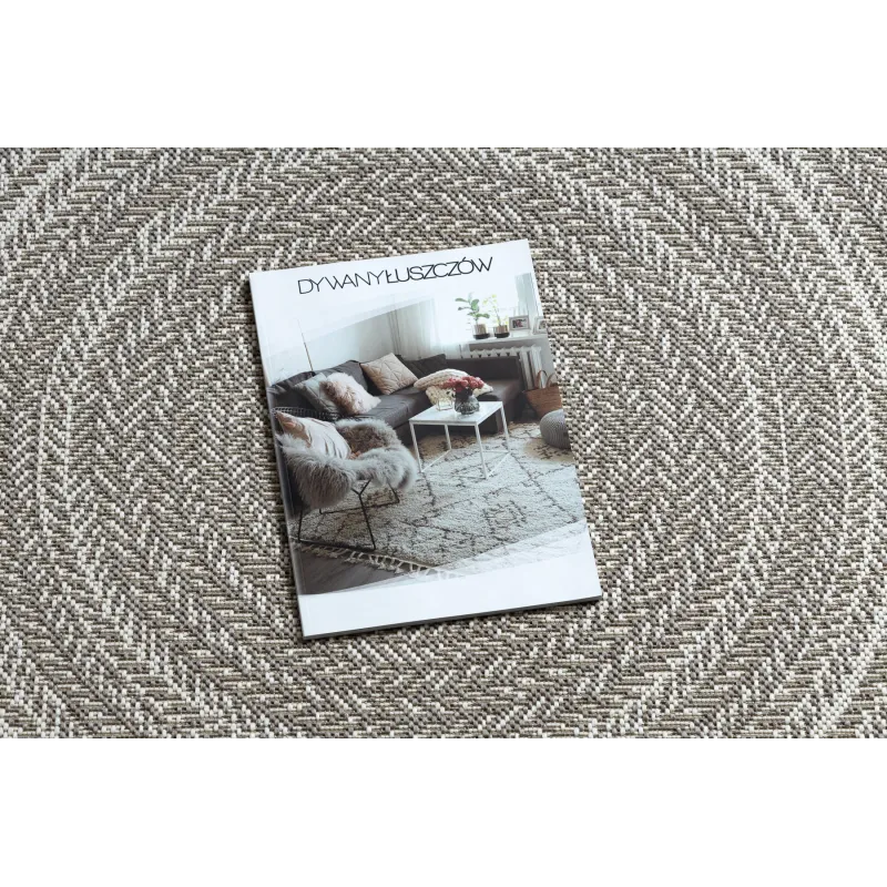 Tappeto circolare in sisal beige, perfetto per interni moderni