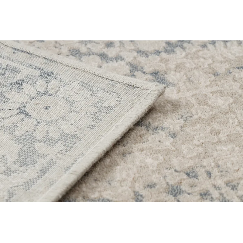 Tappeto NAIN morbido con ornamento vintage in tonalità delicate