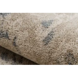 Tappeto NAIN per la camera da letto in tonalità vintage delicate
