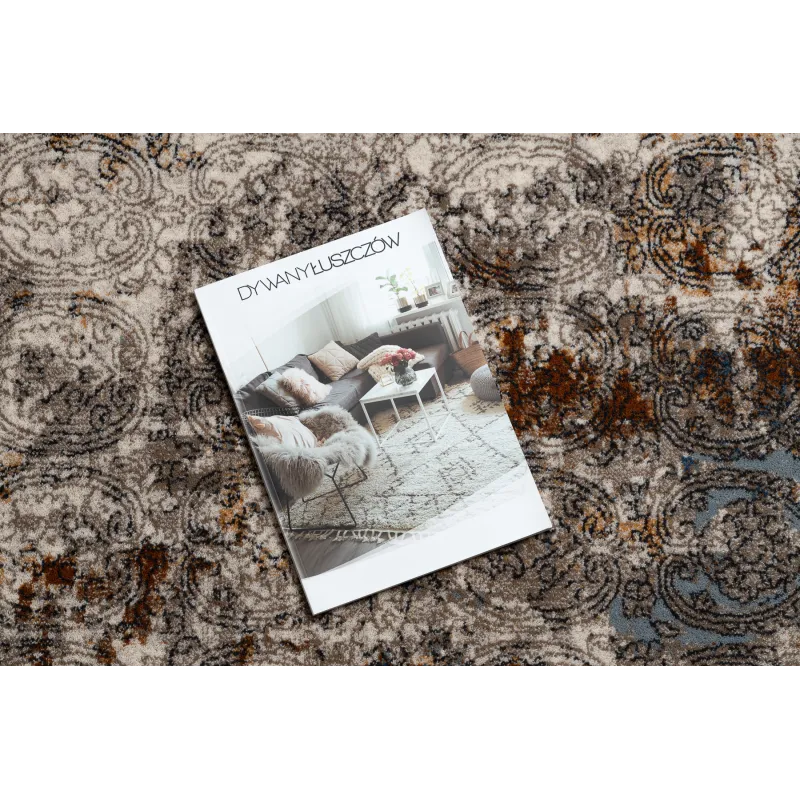 Tappeto moderno in beige e blu scuro per interni eleganti