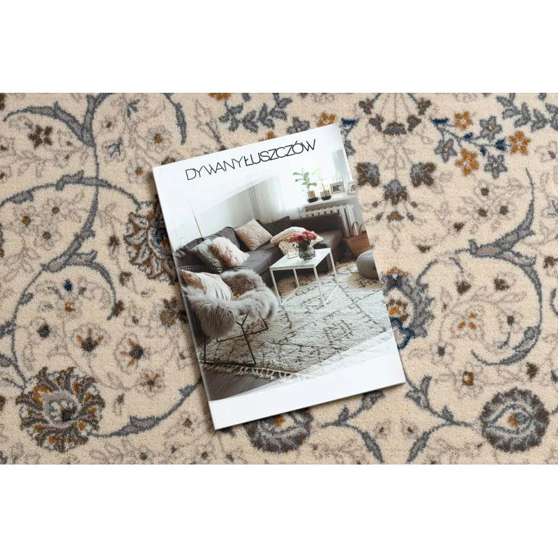 Tappeto elegante in tonalità beige e blu, ideale per interni moderni