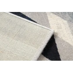 Tappeto morbido in lana, perfetto per rendere accogliente la camera da letto