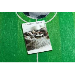 Tappeto per bambini verde con design da campo da calcio