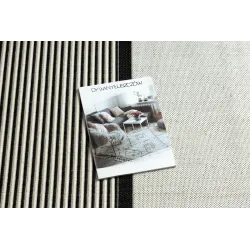 Elegante tappeto in sisal crema e nero, ideale per interni moderni