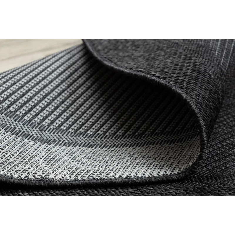 Tappeto rotondo in sisal nero, perfetto per aree relax in giardino
