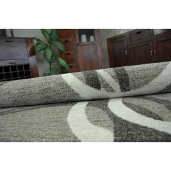 Tappeto con superficie liscia, perfetto per soggiorni o camere da letto